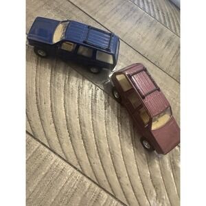 Maisto Vtg 1:42 Ford Explorer Cars (2)  Burgundy Blue